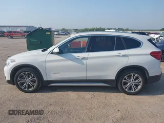 2016 BMW X1 xDrive28i z VIN WBXHT3Z37G4A48242, wystawiony jako IAAI lot #42473404 z przebiegiem 34 309 mil mil oraz . Historia ofert i sprzedaży dostępna na DreamBid. Obrazek 15.