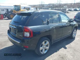 2014 Jeep Compass Limited with VIN 1C4NJDCBXED706173, listed as a IAAI auction lot 41784040 with 144,368 mi miles. Bid and sale history available at carsss.com. Image 4.