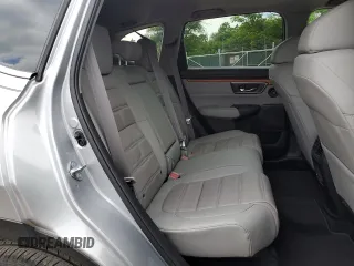 2018 Honda CR-V EX-L z VIN 2HKRW2H89JH675314, wystawiony jako Copart lot #58547525 z przebiegiem 1 268 mil mil oraz Szkoda całkowita • Salvage title. Historia ofert i sprzedaży dostępna na DreamBid. Obrazek 11.