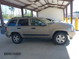 2005 Jeep Grand Cherokee Laredo with VIN 1J4GR48K05C619957, listed as a IAAI auction lot 42626093 with 279,017 mi miles and . Bid and sale history available at DreamBid. Image 13.