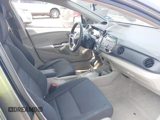 2010 Honda Insight EX with VIN JHMZE2H71AS043465, listed as a IAAI auction lot 42312556 with 151,009 mi miles and . Bid and sale history available at DreamBid. Image 5.