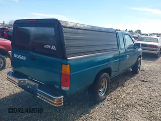 1997 Nissan Frontier XE z VIN 1N6SD16S8VC414870, wystawiony jako IAAI lot #41830303 z przebiegiem 103 158 mil mil oraz . Historia ofert i sprzedaży dostępna na DreamBid. Obrazek 4.