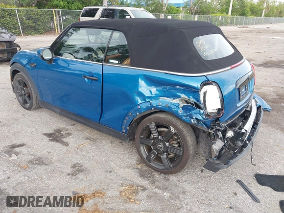 2022 MINI Convertible Cooper S z VIN WMW43DL06N3P19784, wystawiony jako IAAI lot #42635816 z przebiegiem 17 053 mil mil oraz . Historia ofert i sprzedaży dostępna na DreamBid. Obrazek 3.