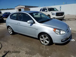 2007 Hyundai Accent SE z VIN KMHCN36C47U027122, wystawiony jako Copart lot #52224605 z przebiegiem 169 022 mil mil oraz Szkoda całkowita • Salvage title. Historia ofert i sprzedaży dostępna na DreamBid. Obrazek 4.