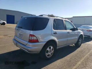 2002 Mercedes-Benz M-Class with VIN 4JGAB54E62A297849, listed as a Copart auction lot 83912114 with 240,479 mi miles and Salvage Title. Bid and sale history available at carsss.com. Image 3.