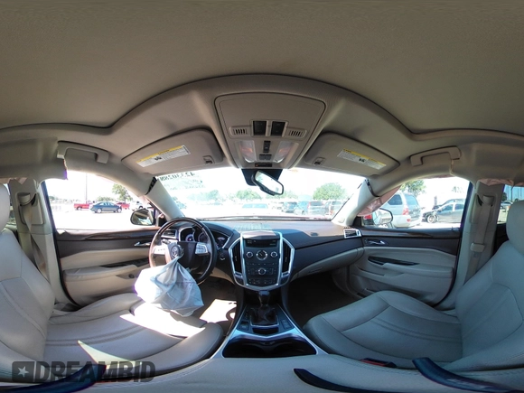 2012 Cadillac SRX Performance Collection with VIN 3GYFNBE36CS544861, listed as a IAAI auction lot 42330288 with 172,335 mi miles and . Bid and sale history available at DreamBid. Image 18.
