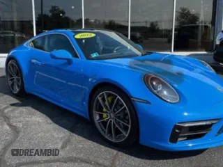 2022 Porsche 911 Carrera with VIN WP0AA2A96NS2061XX, listed as a Copart auction lot 61761515 with 15,219 mi miles and Clean title. Bid and sale history available at DreamBid. Image 4.