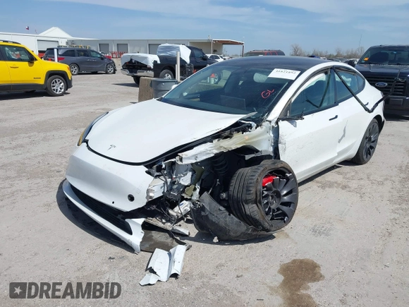2021 Tesla Model 3 Performance with VIN 5YJ3E1EC8MF044388, listed as a IAAI auction lot 41821892 with Not Provided miles and . Bid and sale history available at carsss.com. Image 18.