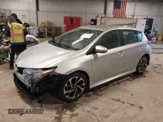 2016 Scion iM with VIN JTNKARJE7GJ519342, listed as a IAAI auction lot 41719786 with 94,191 mi miles. Bid and sale history available at carsss.com. Image 2.