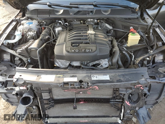 2017 Volkswagen Touareg Sport with VIN WVGEF7BP0HD005996, listed as a Copart auction lot 72883304 with 66,167 mi miles and Salvage Title. Bid and sale history available at DreamBid. Image 12.