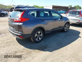 2019 Honda CR-V LX with VIN 2HKRW5H32KH410676, listed as a IAAI auction lot 42038654 with 94,342 mi miles. Bid and sale history available at carsss.com. Image 4.