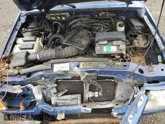 2007 Ford Ranger XLT z VIN 1FTZR45E77PA92881, wystawiony jako Copart lot #57588485 z przebiegiem Nie podano mil oraz Szkoda całkowita • Salvage title. Historia ofert i sprzedaży dostępna na DreamBid. Obrazek 11.