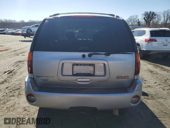 2006 GMC Envoy SLT with VIN 1GKDS13S362362176, listed as a Copart auction lot 43038795 with 180,279 mi miles and Salvage Title. Bid and sale history available at carsss.com. Image 6.