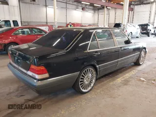 1995 Mercedes-Benz S with VIN WDBGA57E7SA215316, listed as a IAAI auction lot 42217406 with 96,084 mi miles and . Bid and sale history available at DreamBid. Image 4.