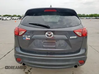 2016 Mazda CX-5 Touring z VIN JM3KE2CY7G0654292, wystawiony jako Copart lot #53433745 z przebiegiem 168 273 mil mil oraz Szkoda całkowita • Salvage title. Historia ofert i sprzedaży dostępna na DreamBid. Obrazek 6.