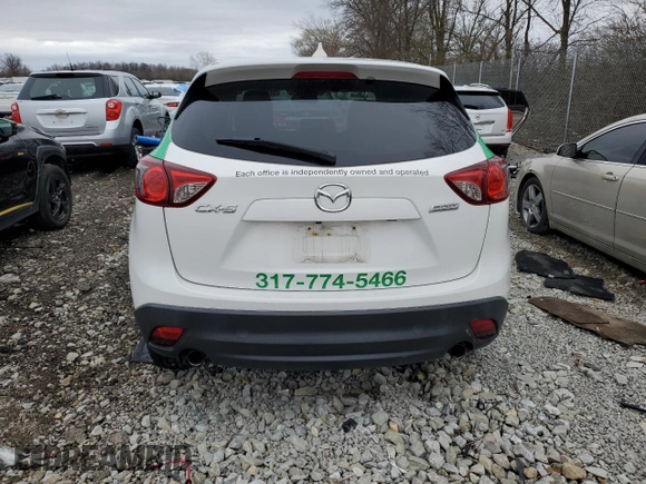 2016 Mazda CX-5 Touring with VIN JM3KE2CY4G0605549, listed as a Copart auction lot 51176155 with 0 mi miles and Salvage Title. Bid and sale history available at carsss.com. Image 6.