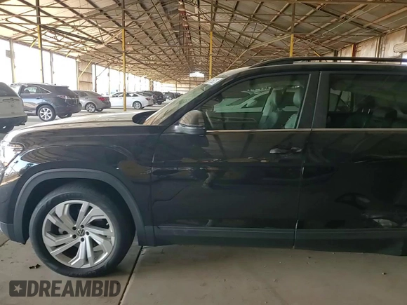 2021 Volkswagen Atlas SE with VIN 1V2WR2CA6MC596444, listed as a Copart auction lot 57615625 with 56,749 mi miles and Salvage title. Bid and sale history available at DreamBid. Image 14.