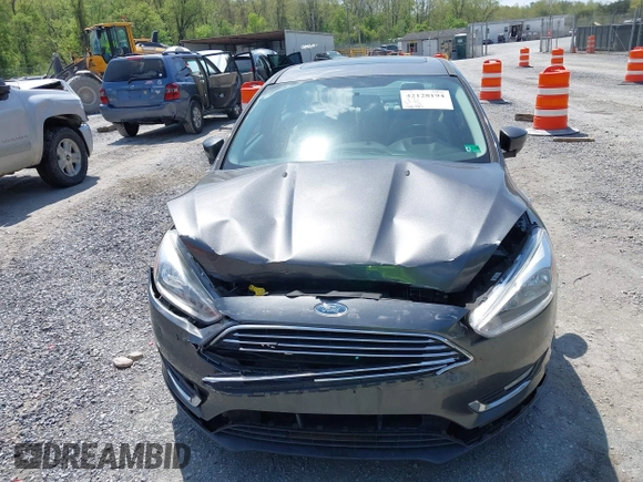 2018 Ford Focus Titanium с VIN 1FADP3J22JL314642, выставлен на аукционе IAAI как лот 42128194 с пробегом 62 787 миль миль и . История ставок и продаж доступна на DreamBid. Изображение 6.