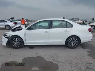 2016 Volkswagen Jetta Sport z VIN 3VWD17AJ1GM334234, wystawiony jako IAAI lot #42299618 z przebiegiem 86 143 mil mil oraz . Historia ofert i sprzedaży dostępna na DreamBid. Obrazek 14.