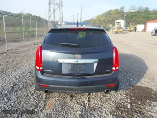 2014 Cadillac SRX Luxury Collection with VIN 3GYFNEE32ES610813, listed as a IAAI auction lot 42098401 with 112,000 mi miles. Bid and sale history available at carsss.com. Image 16.