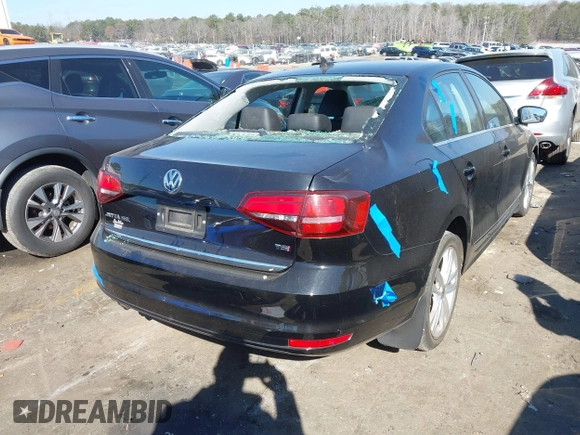 2017 Volkswagen Jetta SEL z VIN 3VWL17AJ5HM246543, wystawiony jako IAAI lot #41650614 z przebiegiem 112 168 mil mil oraz . Historia ofert i sprzedaży dostępna na DreamBid. Obrazek 4.