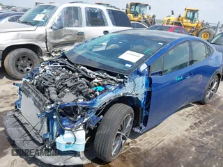 2024 Toyota Prius LE z VIN JTDACAAU8R3019555, wystawiony jako IAAI lot #42160410 z przebiegiem 15 529 mil mil oraz . Historia ofert i sprzedaży dostępna na DreamBid. Obrazek 18.