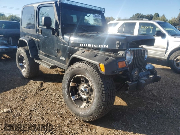 2004 Jeep Wrangler Rubicon with VIN 1J4FA69S44P734355, listed as a Copart auction lot 72381334 with 113,024 mi miles and Salvage Title. Bid and sale history available at carsss.com. Image 4.