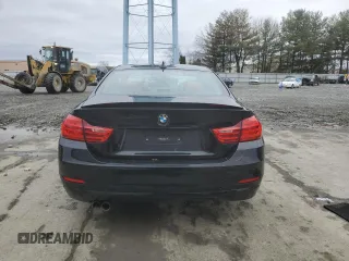 2014 BMW 4 Series 428i xDrive with VIN WBA3N5C51EF715759, listed as a Copart auction lot 48962695 with 90,936 mi miles and Salvage Title. Bid and sale history available at DreamBid. Image 6.