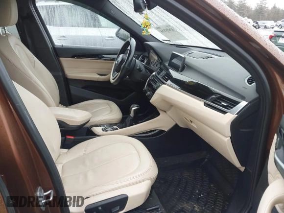 2016 BMW X1 xDrive28i with VIN WBXHT3C31GP881488, listed as a IAAI auction lot 41693116 with 120,922 mi miles. Bid and sale history available at carsss.com. Image 5.