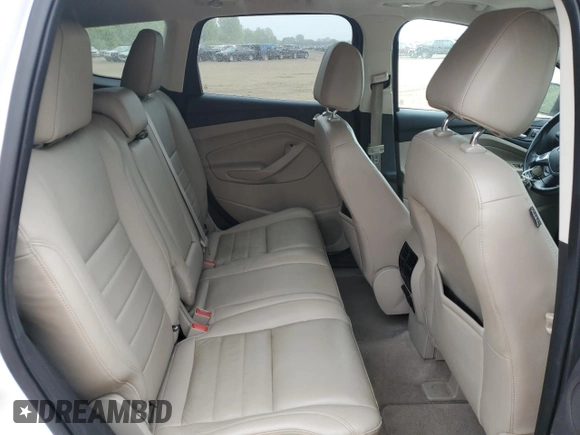2014 Ford Escape Titanium с VIN 1FMCU0J97EUA87342, выставлен на аукционе Copart как лот 58790145 с пробегом 174 663 миль миль и Чистый • Clean title. История ставок и продаж доступна на DreamBid. Изображение 11.