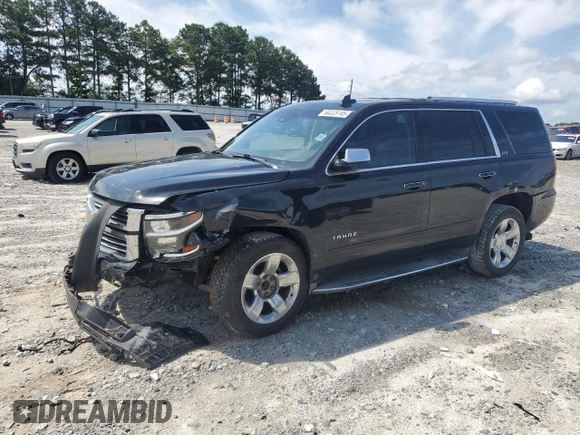 2015 Chevrolet Tahoe LTZ with VIN 1GNSCCKC2FR693500, listed as a Copart auction lot 60225195 with 206,210 mi miles and Salvage title. Bid and sale history available at DreamBid. Image 1.
