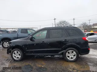 2012 Hyundai Santa Fe GLS with VIN 5XYZG3ABXCG159336, listed as a IAAI auction lot 41635699 with 128,975 mi miles. Bid and sale history available at carsss.com. Image 14.