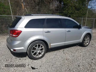 2011 Dodge Journey Crew with VIN 3D4PG3FGXBT571987, listed as a Copart auction lot 53959565 with 152,716 mi miles and Salvage title. Bid and sale history available at DreamBid. Image 3.
