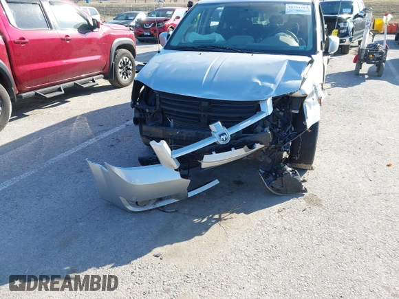 2010 Dodge Grand Caravan SXT with VIN 2D4RN5D17AR154594, listed as a IAAI auction lot 41751767 with Not Provided miles and . Bid and sale history available at DreamBid. Image 6.