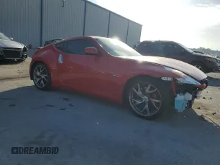 2014 Nissan 370Z with VIN JN1AZ4EHXEM631132, listed as a Copart auction lot 53753545 with 19,276 mi miles and Salvage Title. Bid and sale history available at carsss.com. Image 4.