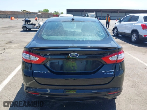 2016 Ford Fusion Titanium Hybrid z VIN 3FA6P0RUXGR123445, wystawiony jako IAAI lot #42606596 z przebiegiem 145 541 mil mil oraz . Historia ofert i sprzedaży dostępna na DreamBid. Obrazek 17.