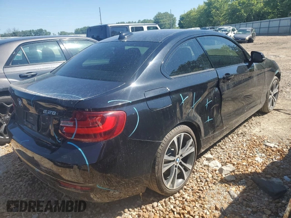 2014 BMW 2 Series 228i with VIN WBA1F5C58EV256093, listed as a Copart auction lot 57579434 with 74,596 mi miles and Salvage title. Bid and sale history available at DreamBid. Image 3.