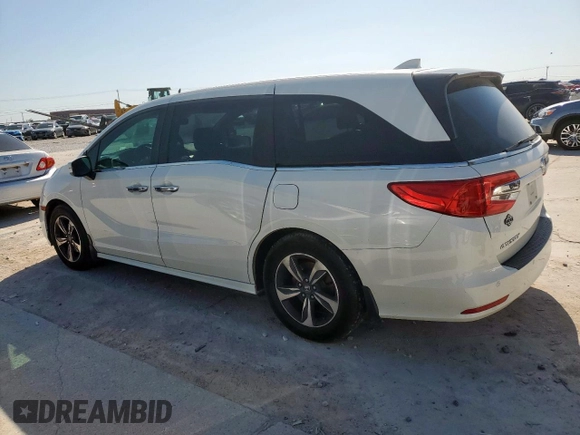 2018 Honda Odyssey Touring с VIN 5FNRL6H8XJB042111, выставлен на аукционе Copart как лот 52360005 с пробегом 126 835 миль миль и Чистый • Clean title. История ставок и продаж доступна на DreamBid. Изображение 2.