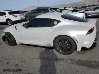 2023 Toyota GR Supra 3.0 with VIN WZ1DB0G00PW055929, listed as a Copart auction lot 76407574 with 16,889 mi miles and Salvage Title. Bid and sale history available at carsss.com. Image 2.