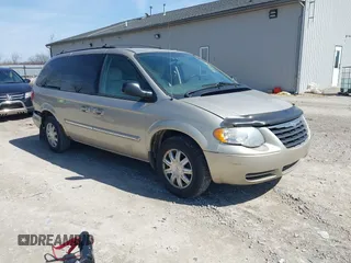 2005 Chrysler Town & Country Touring with VIN 2C4GP54LX5R132272, listed as a IAAI auction lot 41860741 with 138,402 mi miles and . Bid and sale history available at DreamBid. Image 1.