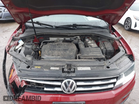 2018 Volkswagen Tiguan S with VIN 3VV1B7AX8JM124827, listed as a IAAI auction lot 41544321 with 101,492 mi miles and . Bid and sale history available at DreamBid. Image 10.