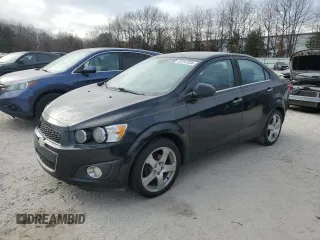 2012 Chevrolet Sonic LTZ z VIN 1G1JE5SH9C4124263, wystawiony jako Copart lot #87247334 z przebiegiem 150 194 mil mil oraz Czysty tytuł • Clean title. Historia ofert i sprzedaży dostępna na DreamBid. Obrazek 1.