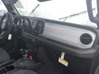 2024 Jeep Gladiator Sport z VIN 1C6HJTAG5RL127973, wystawiony jako IAAI lot #41248039 z przebiegiem 2 648 mil mil oraz . Historia ofert i sprzedaży dostępna na DreamBid. Obrazek 5.