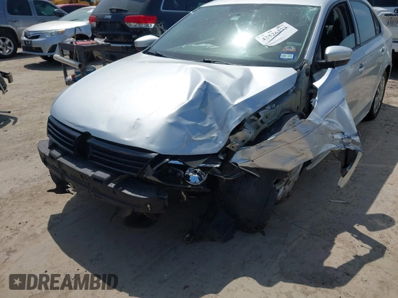 2012 Volkswagen Jetta SE with VIN 3VWBP7AJXCM340937, listed as a IAAI auction lot 42526373 with 157,113 mi miles and . Bid and sale history available at DreamBid. Image 6.