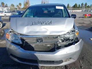 2011 Honda Odyssey EX-L with VIN 5FNRL5H6XBB057556, listed as a IAAI auction lot 41808620 with 154,449 mi miles. Bid and sale history available at carsss.com. Image 6.