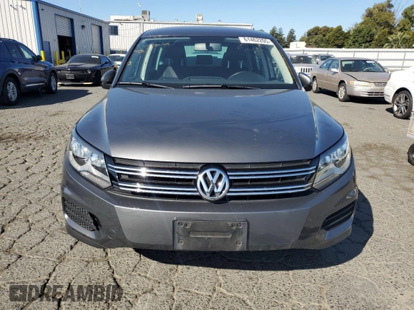 2014 Volkswagen Tiguan SEL with VIN WVGAV3AX8EW585929, listed as a Copart auction lot 61462205 with 63,899 mi miles and Salvage title. Bid and sale history available at DreamBid. Image 5.