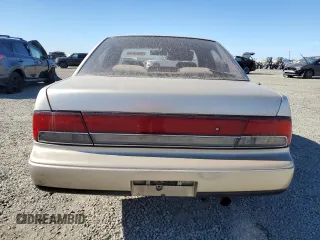 1992 Nissan Maxima z VIN JN1HJ01P6NT623546, wystawiony jako Copart lot #78095314 z przebiegiem 104 718 mil mil oraz Szkody całkowita. Historia ofert i sprzedaży dostępna na DreamBid. Obrazek 6.