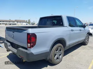 2022 Honda Ridgeline RTL-E z VIN 5FPYK3F78NB028776, wystawiony jako IAAI lot #42077805 z przebiegiem 22 971 mil mil oraz . Historia ofert i sprzedaży dostępna na DreamBid. Obrazek 4.