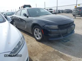2021 Dodge Charger SXT with VIN 2C3CDXBG6MH584365, listed as a IAAI auction lot 41401668 with 84,554 mi miles. Bid and sale history available at carsss.com. Image 1.