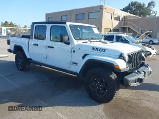 2022 Jeep Gladiator Texas Trail with VIN 1C6HJTAG4NL149537, listed as a IAAI auction lot 41947122 with 43,938 mi miles. Bid and sale history available at carsss.com. Image 1.